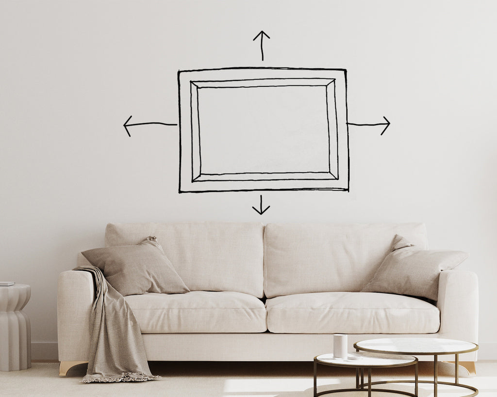 How to hang pictures above a couch